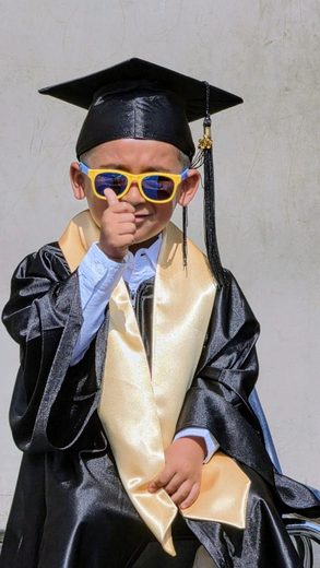 Roman in cap and gown